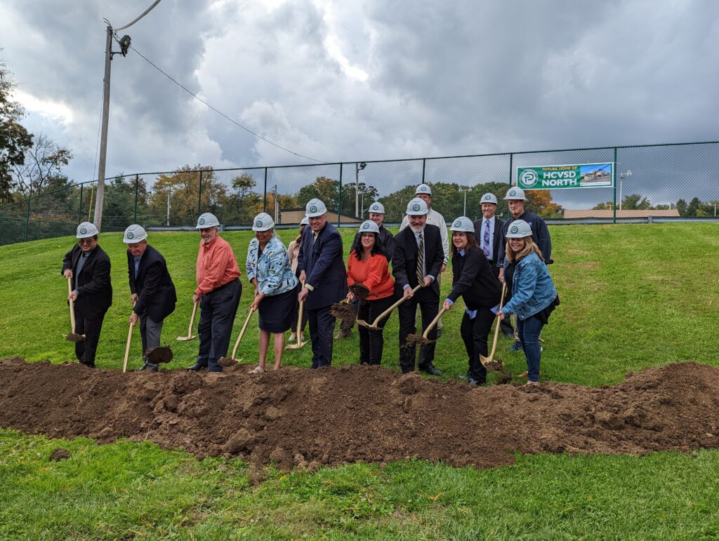 photo of administrators and board members breaking ground