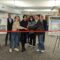 photo of students cutting ribbon